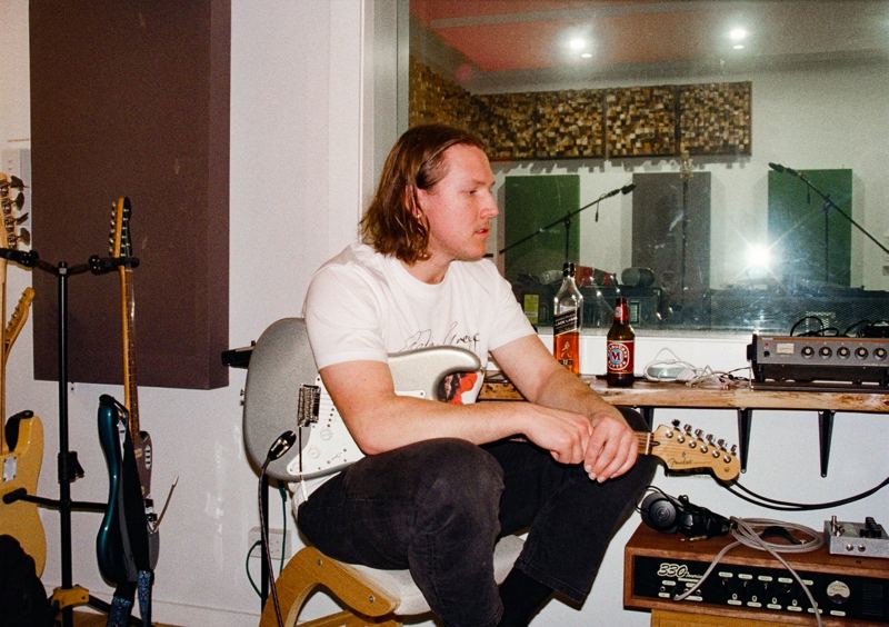 Aodhan in the studio: sitting in the control room between takes